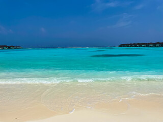Fototapeta na wymiar Maldives tropical beach with blue sea and beach