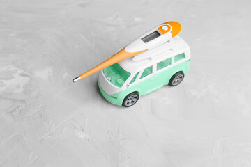 Toy car with a thermometer on the roof