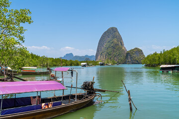 Banhinrom village, Pier for boat to Khao Tapu or James Bond Island, famous tourist destination in Ao Phang-Nga Bay National Park, near Phuket, Thailand