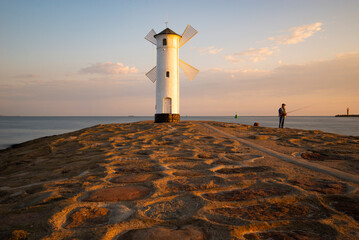 Lighthouse windmill Stawa Mlyny, Swinoujscie, Baltic Sea - Poland - 491831832