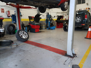 Car workshop with car lift