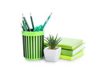 Holder with stationery, notebooks and houseplant on white background