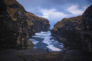 Historical port in Gjogv village, Faroe Islands. November 2021