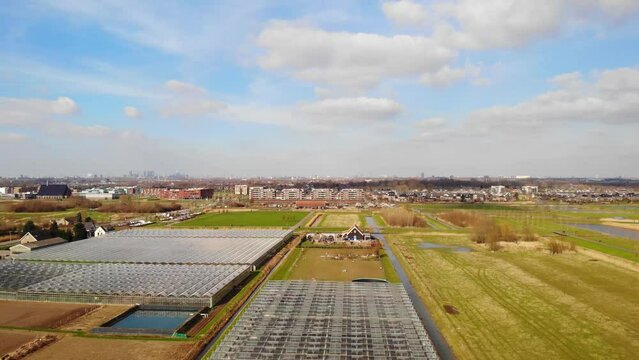 Aerial View Over Industrial Agricultural Greenhouses In Barendrecht. Dolly Shot