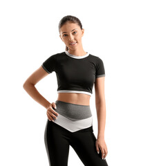 Teenage girl in black sportswear on white background