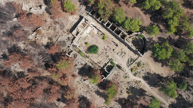 Taurus Mountains. Manavgat. Seleucia (Pamphylia, Lyre, Lyre). Forest fire in the mountains. The ancient ruins of Seleucia. Ancient city on the Mediterranean coast of Pamphylia, in Anatolia
