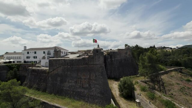 São Filipe Castle overlooking Setubal port city, imposing stronghold; drone
