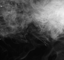 Abstract smoke texture over black. Fog in the darkness.