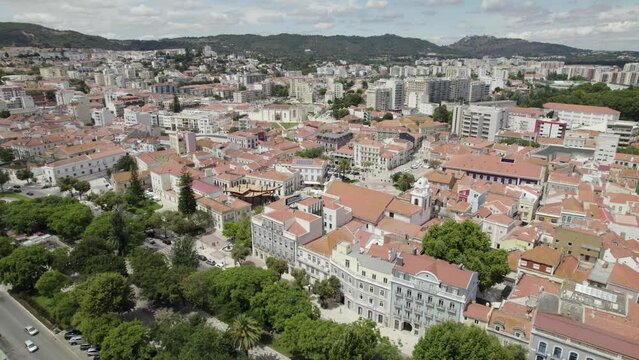Drone view takes in cityscape and infrastructure of Setubal, Portugal