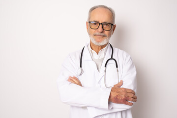 Fototapeta premium Smiling medical doctor with stethoscope. Isolated over white background