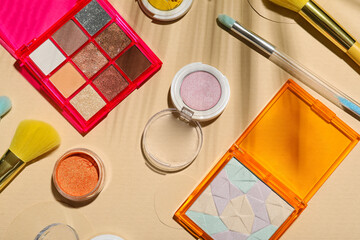 Different cosmetic products on beige background © Pixel-Shot