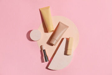 Set of makeup products on color background
