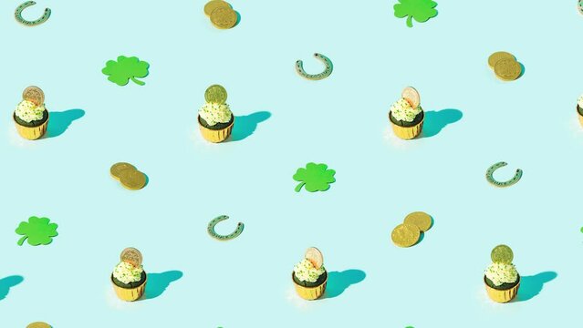 St Patrick's Day isometric pattern. Lucky symbols and sweet food for Saint Patrick's Day party concept. Green velvet cupckake, shamrock, golden coin and horseshoe on blue background