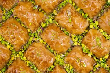 Pistachio baklava. Close-up. Traditional Middle Eastern Flavors. Traditional Turkish baklava. local name fistikli baklava