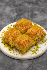 Pistachio baklava. Close-up. Traditional Middle Eastern Flavors. Traditional Turkish baklava. local name fistikli baklava