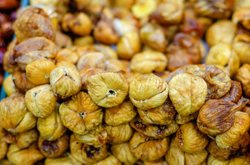 Dried figs. Sale of dried fruits. Dietary food. The concept of healthy eating. Abstract background.