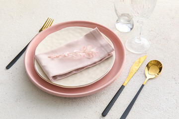 Elegant table setting on light background