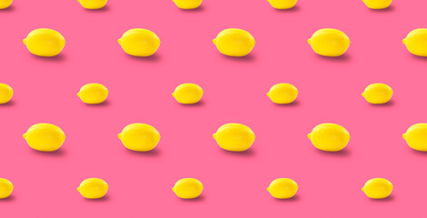 Juicy ripe flying yellow lemons on pink background. creative food concept. Tropical organic fruit, citrus, vitamin C. Lemon slices. Summer minimalistic bright fruit background. pattern. banner. 