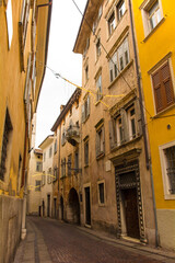 Fototapeta na wymiar A street in the historic centre of Rovereto in Trentino, north east Italy 