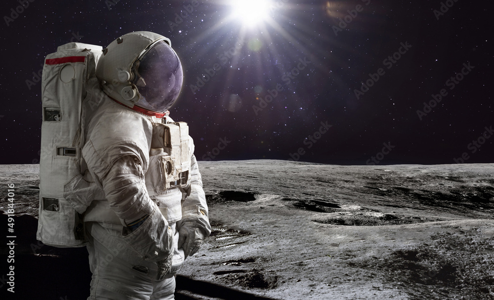 Fototapete astronaut on surface of moon. artemis lunar space program. moonwalk of spaceman. elements of this im