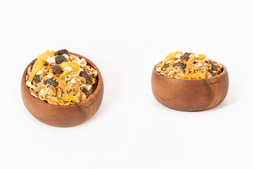 corn flakes in bowl on white background