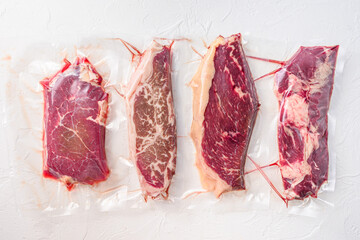 Set  of  vacuum packed organic raw beef alternative cuts: top blade, rump, picanha, chuck roll...