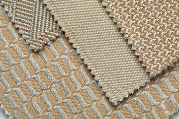 fabric in golden color with geometric patterns. mustard knitted texture, background knitted golden color