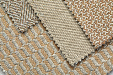 fabric in golden color with geometric patterns. mustard knitted texture, background knitted golden...