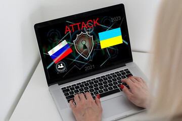 Computer hacker or Cyber attack concept background with Ukraine flag and the Russian bear-hacker