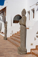 Buddhist statues in front of the hotel entrance for good luck and attraction of tourists, Sharm El Sheikh, Egypt