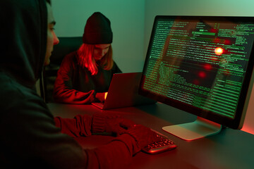 People using computer and programming to break code. Cyber security threat. Internet and network...