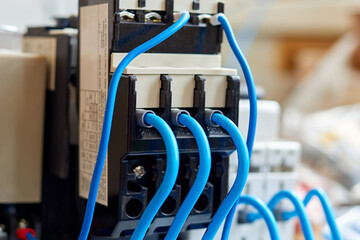 blue wires connected to the magnetic starter relay