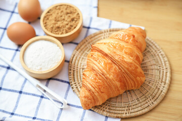 fresh baking almond croissant from homemade bakery cooking. fresh baked for good health care eating lifestyle.