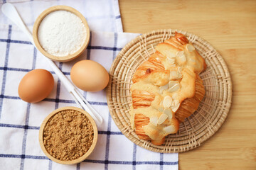 fresh baking almond croissant from homemade bakery cooking. fresh baked for good health care eating lifestyle.