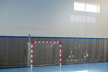 Gym for playing futsal, mini-football. Interior of a sport hall for soccer or handball
