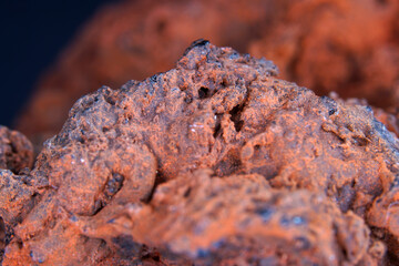 Frozen lava in the studio in front of black background photographed in Marco mode 
