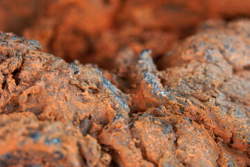 Frozen lava in the studio in front of black background photographed in Marco mode 