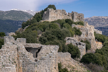 Fototapeta na wymiar View of the Southern Wall of Nimrod fortress with the Keep and the Beautiful Tower, located in Northern Golan, at the southern slope of Mount Hermon, the biggest Crusader-era castle in Israel