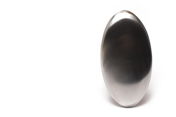 Closeup stainless steel bar soap white background