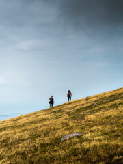 Obraz premium Two men hiking outdoors in moutains