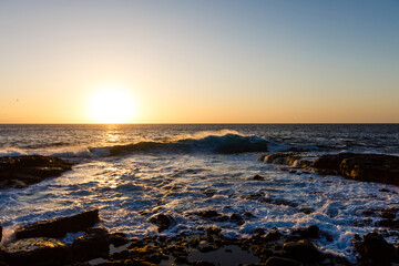 quiet sea coast with stones at the twilight, natural sea background