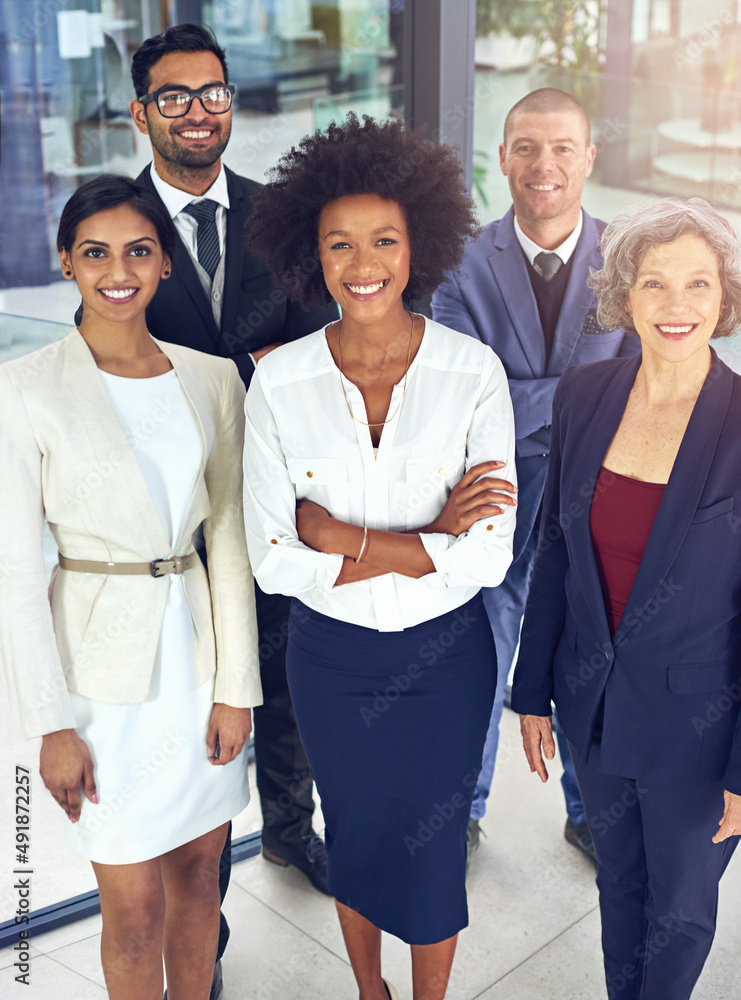 Poster teamwork enables smoother movement towards targets. portrait of a team of corporates standing togeth