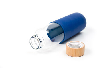Stylish glass water bottle with wooden lid. For fitness and travel.