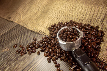 dark roasted coffee beans in portafilter