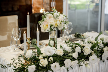 
Wedding table decor with candles and eustoma flowers
