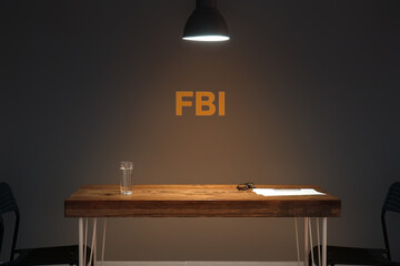 Table in dark interrogation room - obrazy, fototapety, plakaty