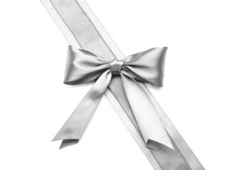 Beautiful silver bow with ribbons on white background