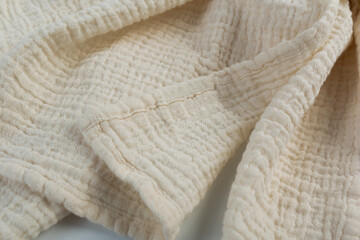 Fototapeta na wymiar Cotton cloth harvester. Natural cotton fabric. Beige header