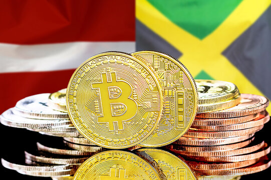 Bitcoins on Latvia and Jamaica flag background