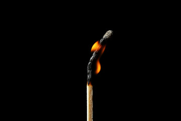 Burning matchstick on black background. Emotional burnout concept - obrazy, fototapety, plakaty